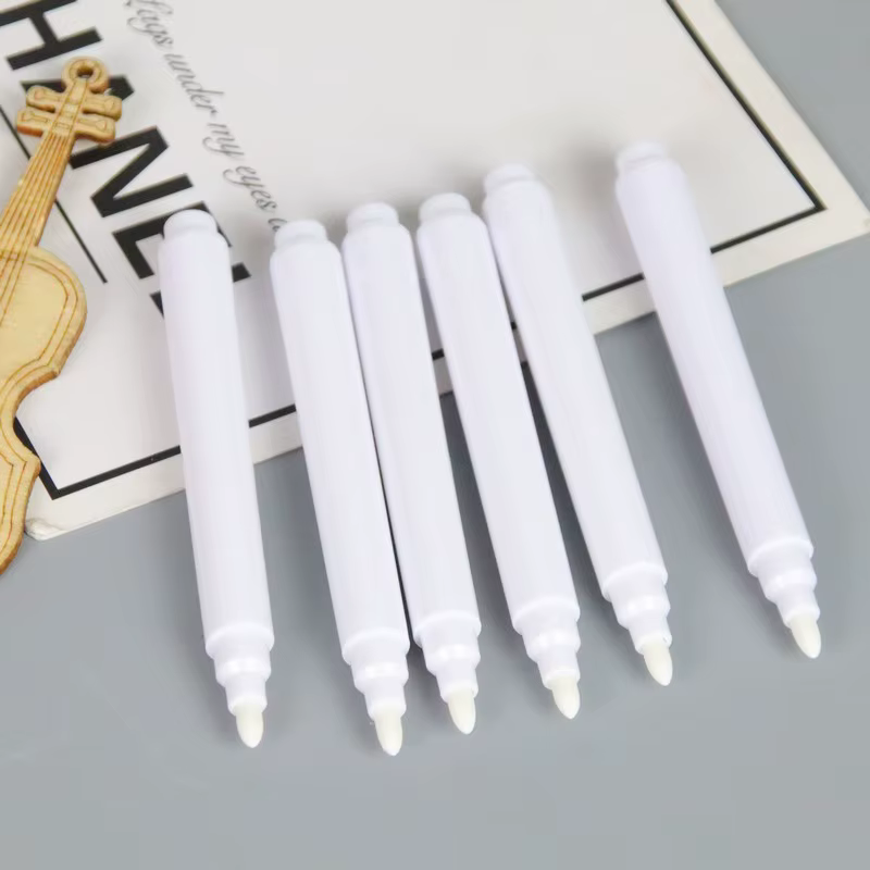 White liquid chalk pens