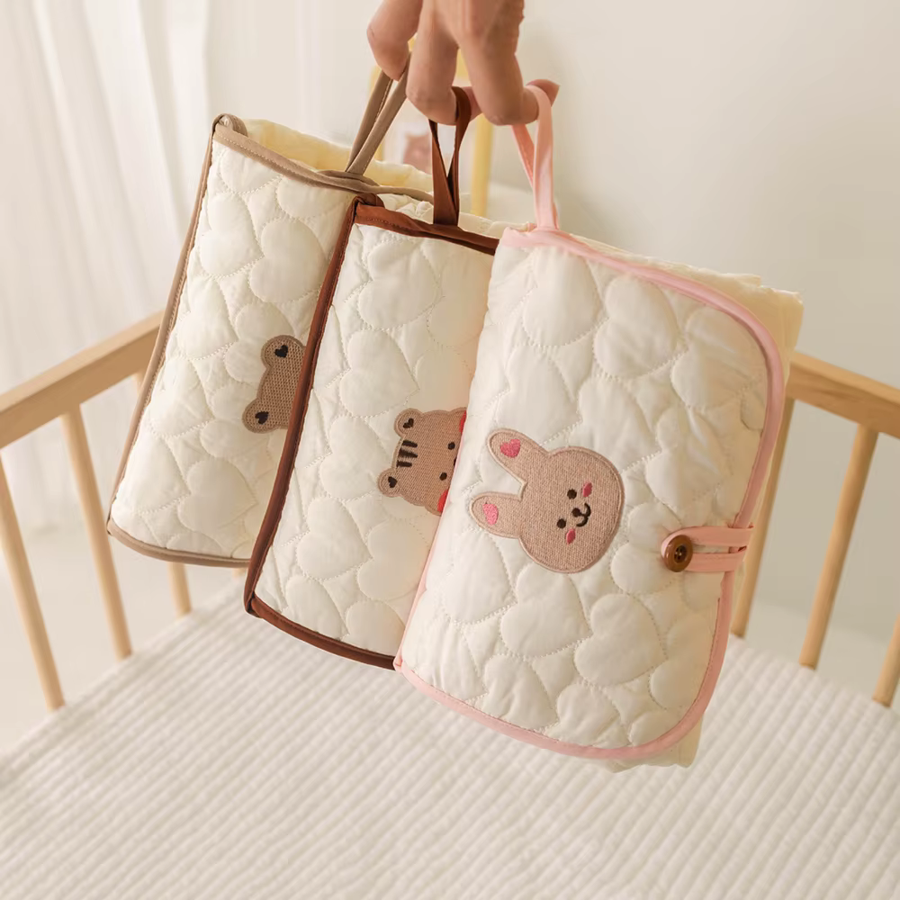 Fold-Up Changing Mat & Clutch