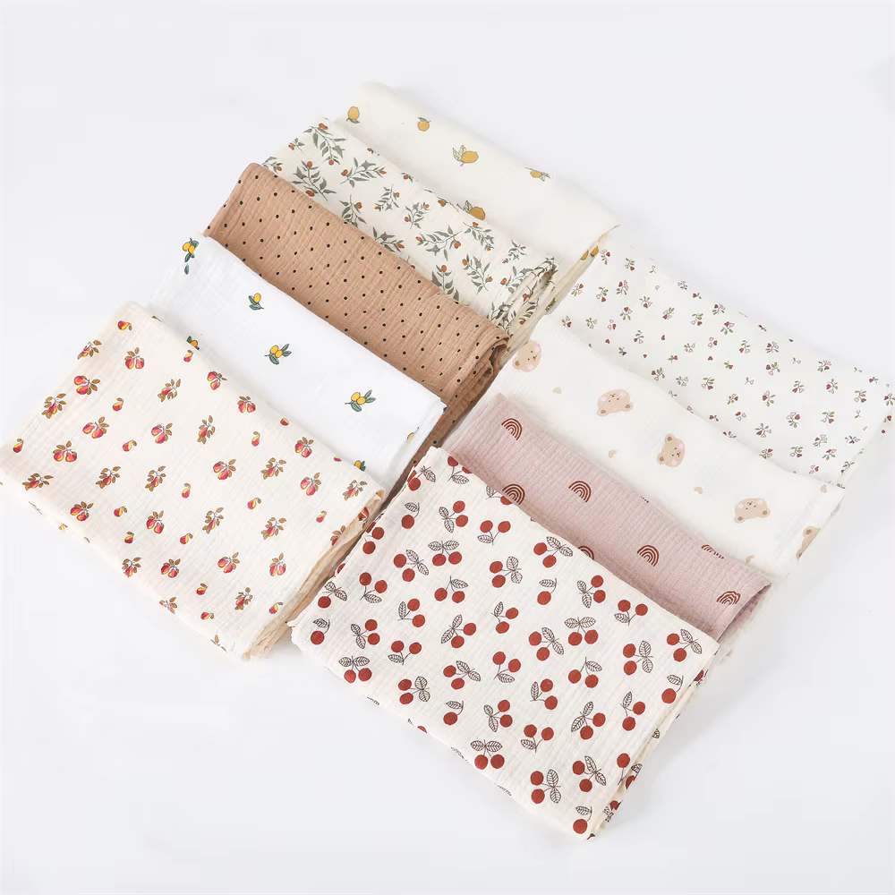Crinkle cotton muslin swaddle in a ditsy floral print