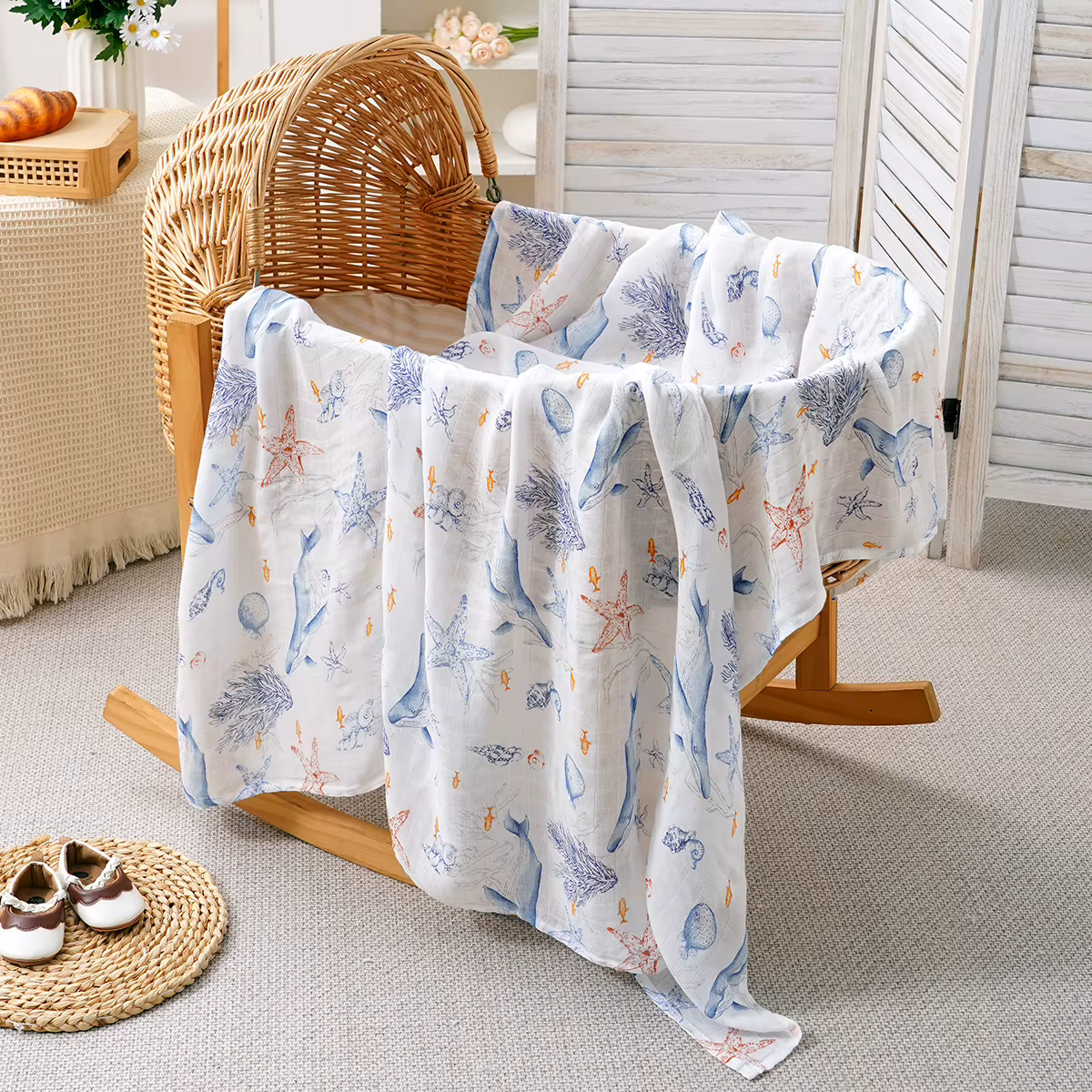 Bamboo muslin swaddle in a blue vintage floral print