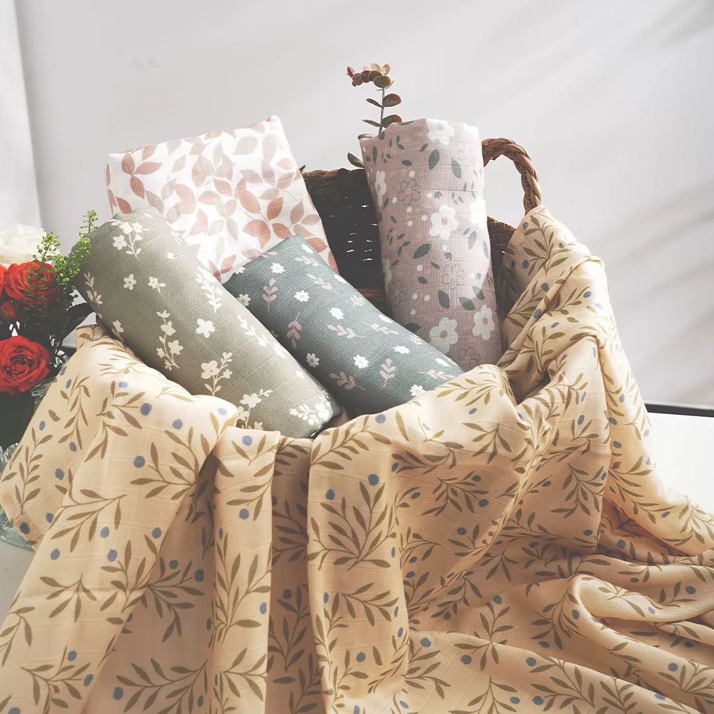 Cotton muslin swaddle with a fresh garden print